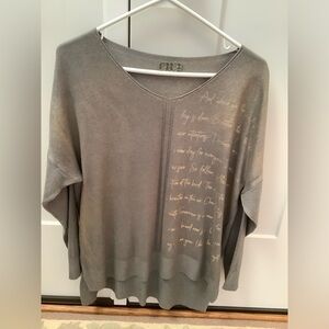 Gray v-neck sweater beautiful lightweight gold text high low hem